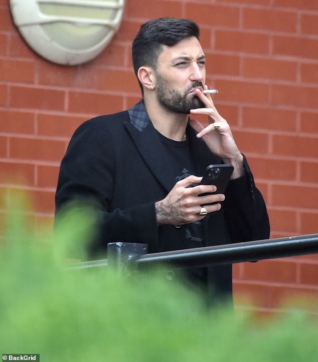 Giovanni seen smoking in Brighton in July