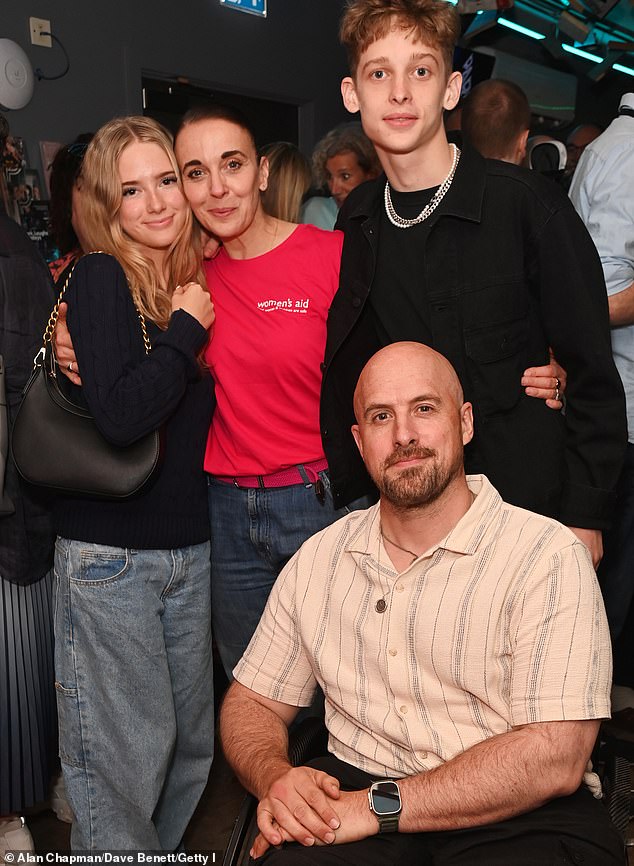 Giovanni is also reported to have made a crude comment about a member of Amanda's own family, only for her to 'effectively be asked' by BBC bosses whether the dancer meant the remark as light-hearted banter (Amanda pictured with son Joe, daughter Grace and fiance Jonathan Goodwin)