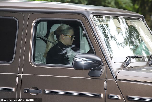 Molly-Mae's mother's appearance at her home comes just a couple of days after her father Stephen was also spotted visiting the house with a bouquet of flowers