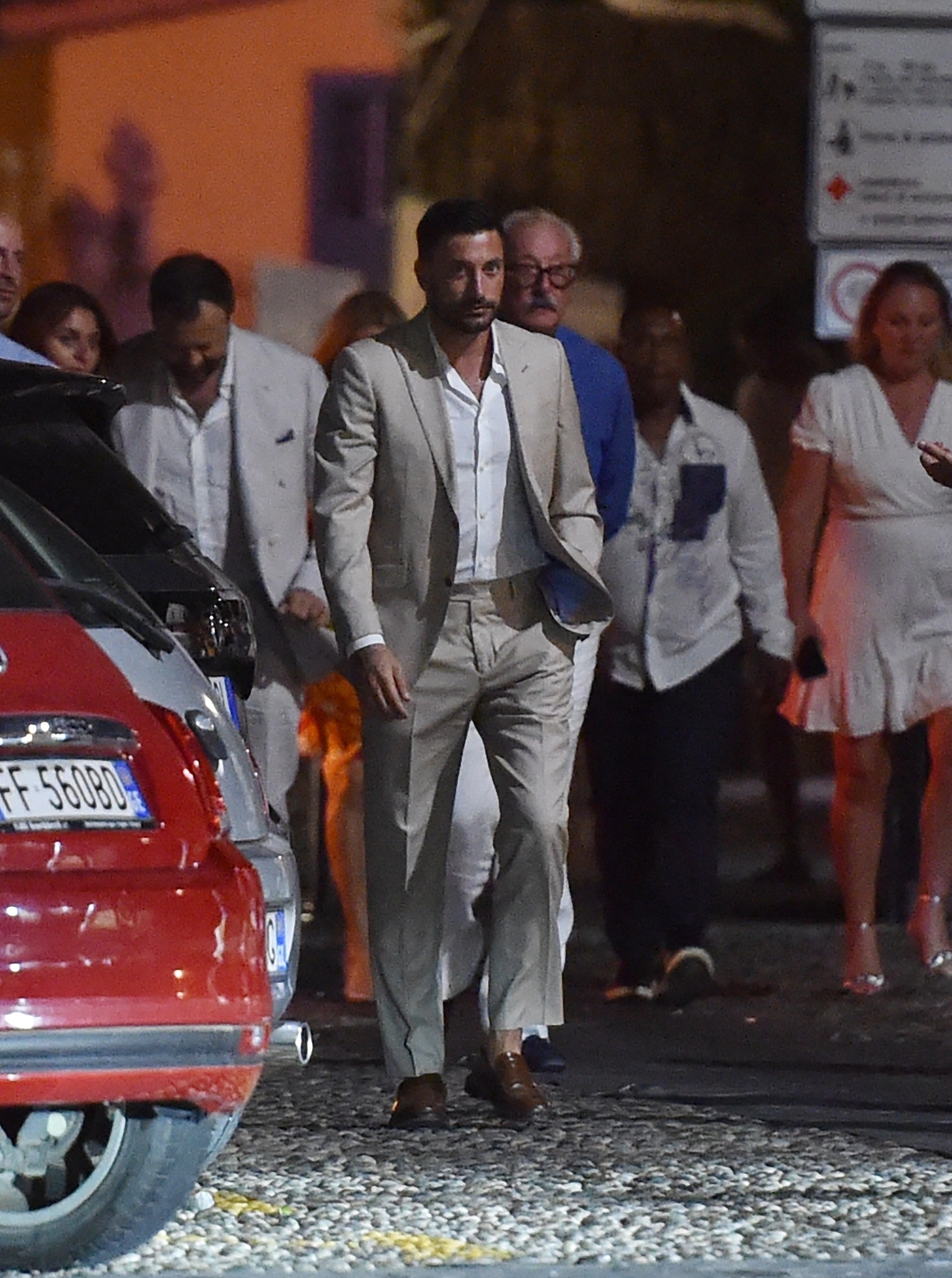 The star had a serious look as he made his way through Portofino